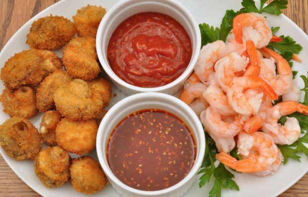 shrimp and deep fried dish with dips