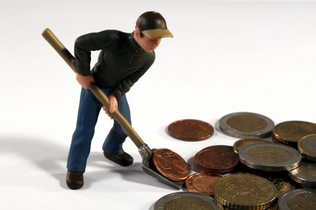 toy figure of a man using a shovel